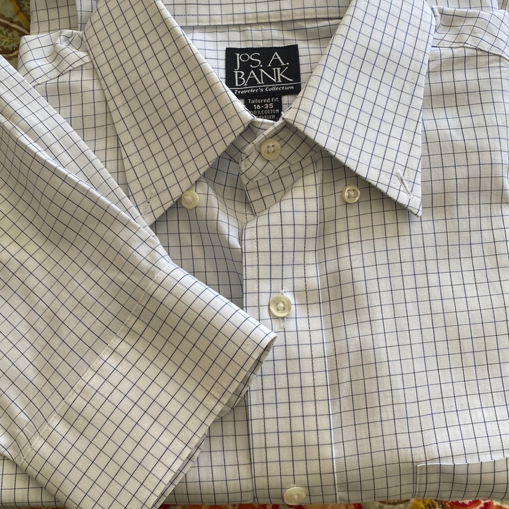 Jos.A.Bank tailored fit button cuff collared shirt.